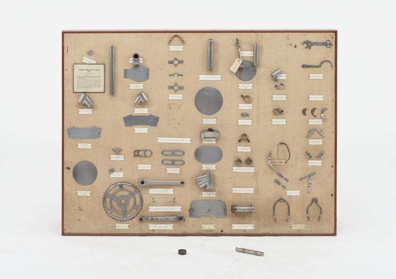 Set of bicycle parts on a board