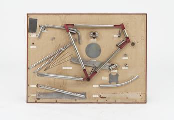 Set of bicycle parts on a board