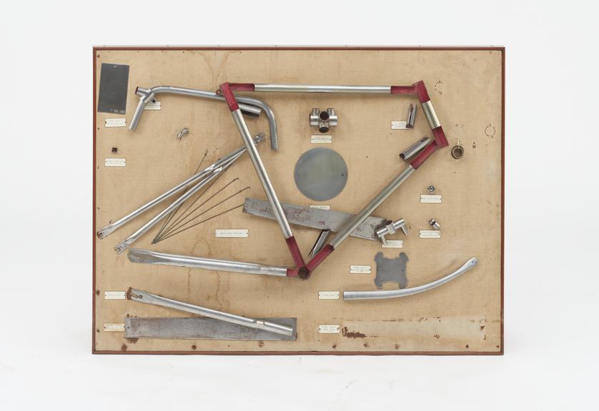 Set of bicycle parts on a board