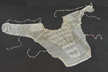 Modesty bodice with bands of lace