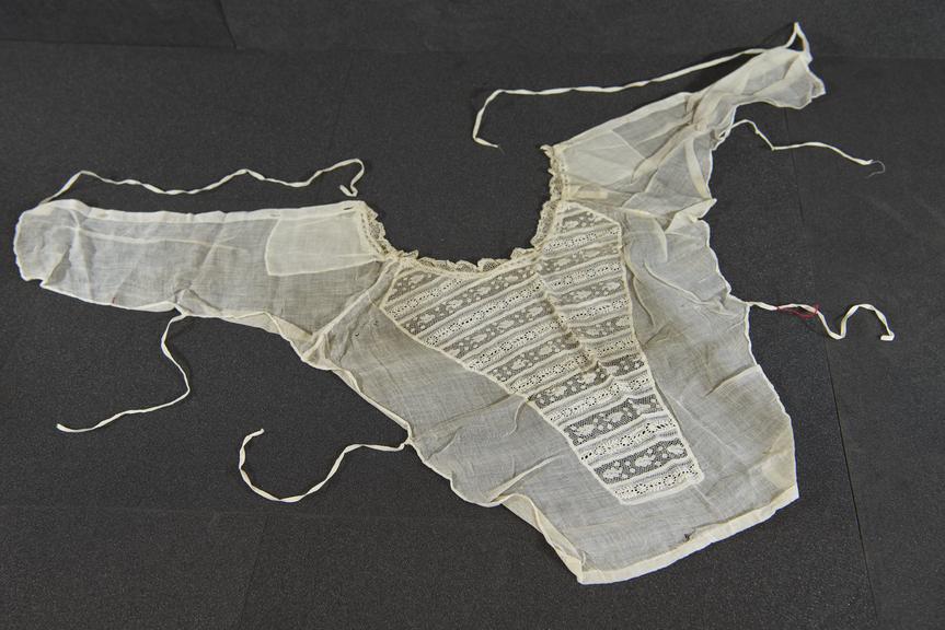 Modesty bodice with bands of lace