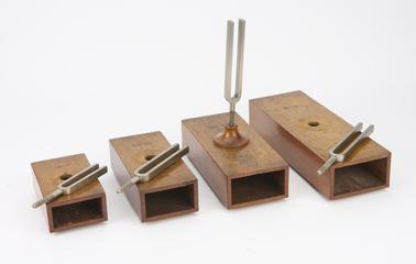 Four tuning forks on resonators