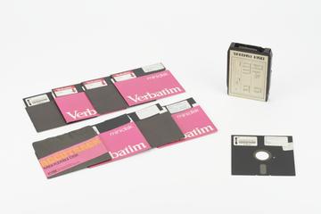 BASIC ROM cartridge and 8 floppy disks