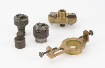 Two drill chucks: an oval chuck and ring and an adaptor chuck
