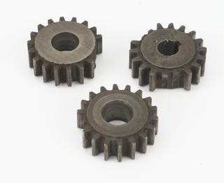 Three pinions from the tumbler reverse.