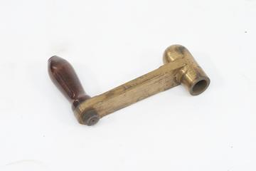 Spurious crank handle found with Franklin's electrostatic machine. Machined from brass