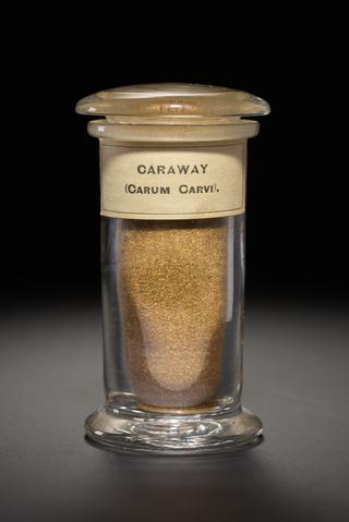 Brown herb in the form of powdered seeds