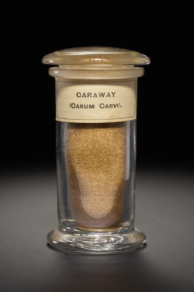 Brown herb in the form of powdered seeds