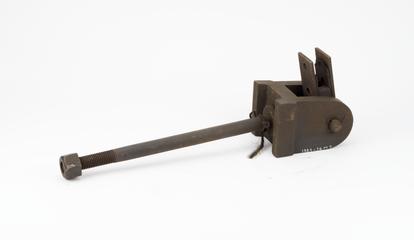 Metal bracket numbered 2709, possibly part of bell hanging for one of the bells set up in connection with the Wells cathedral clock