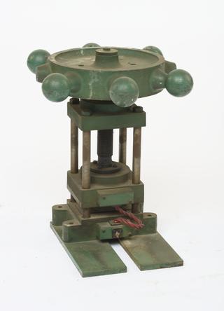 Press used to compress heated PMMA sheets