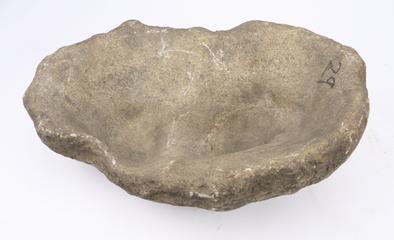 stone with two depressions for grinding