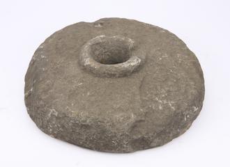 Stone with hole and depression