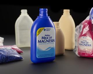 stages in the manufacture of two sizes of 'Milk of Magnesia' bottles
