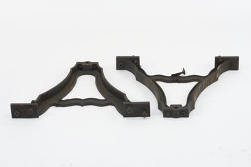 Two cast A-frames for supporting one of the bells set up in connection with the Wells cathedral clock