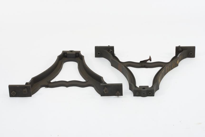 Two cast A-frames for supporting one of the bells set up in connection with the Wells cathedral clock