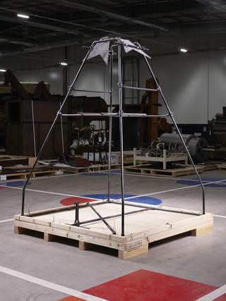 Replica R.H. Goddard liquid-fuel rocket and launch frame