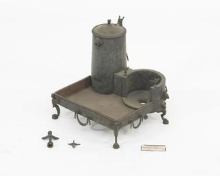 Bronze relica of a small furnace