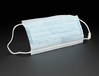 Face covering worn as PPE by people testing COVID-19 samples