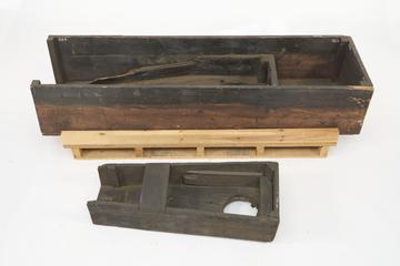 Trough for cross-over pipe