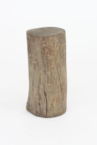 Log, Used as a Stand for a Mortar