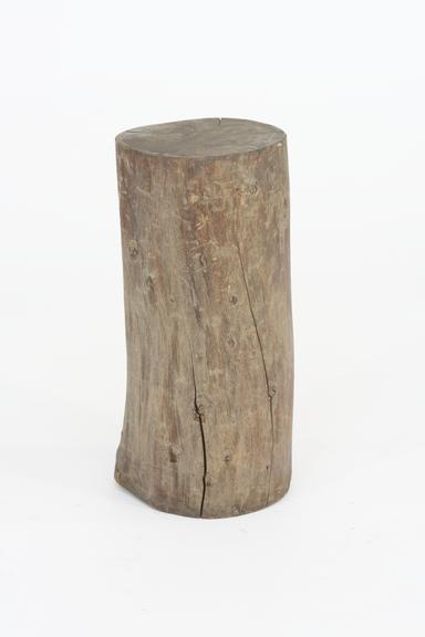 Log, Used as a Stand for a Mortar