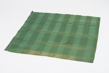Curtain, green, from night compartment of railway carriage