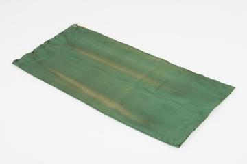 Curtain, green, from night compartment of railway carriage
