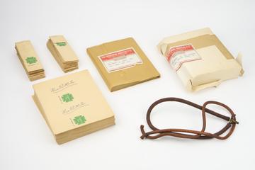 Box of printed papers & made bags