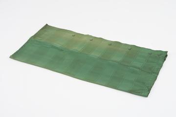 Curtain, green, from night compartment of railway carriage