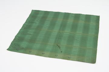 Curtain, green, from night compartment of railway carriage
