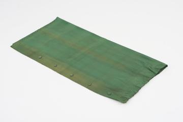 Curtain, green, from night compartment of railway carriage