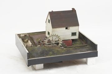 Model to illustrate water power:- One model of water mill