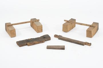 The following items of unknown purpose : two pairs of beech blocks