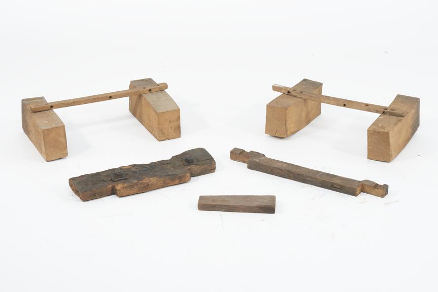The following items of unknown purpose : two pairs of beech blocks