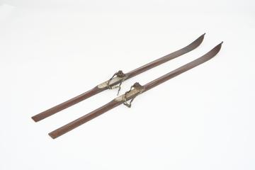 Pair of wooden skis with leather bindings