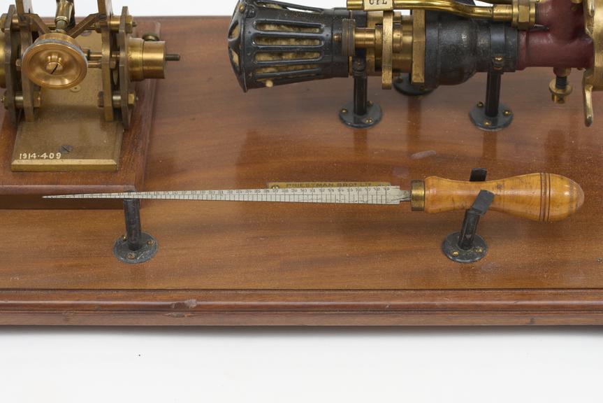 Detail part of Priestman oil engine:- steel gauge