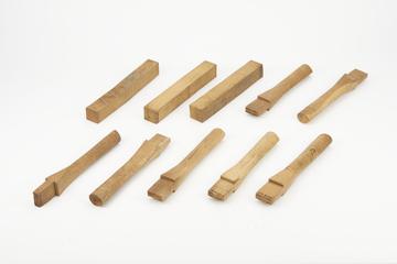 7 Machine spokes in oak and 2 sawn oak billets