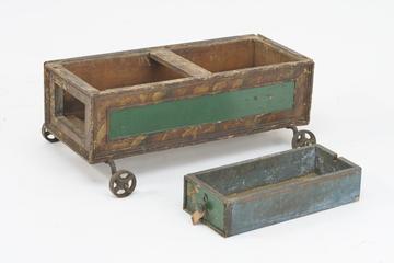 Four-wheeled trolley with drawer