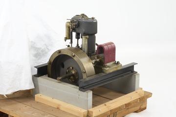 Single cylinder petrol motor with mechanically operated valves and magneto ignition