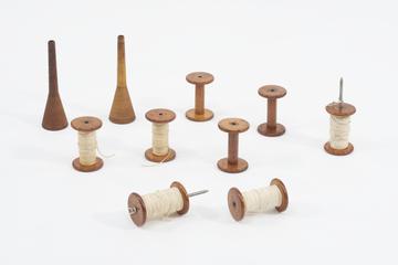 Three wooden reels
