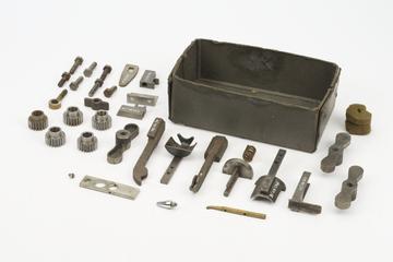 Purdy's labelling machine 'Universal'. Small machine components including spur wheels
