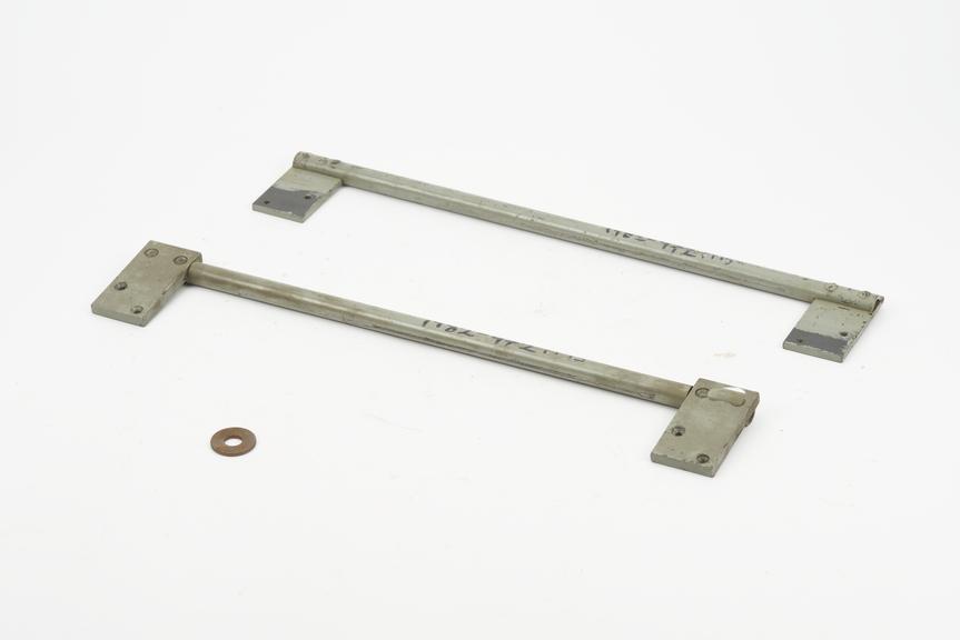 Two metal fittings