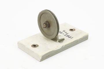Pulley mounted on boards