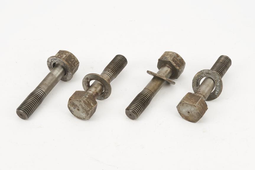 4 holding-down bolts and washers, probably for /3