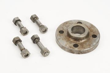 Flange probably from original driving gear (shaft on /3) and four fitted studs stamped up to match