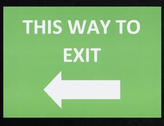“THIS WAY TO EXIT” sign from Liverpool mass testing programme