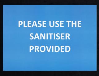 “PLEASE USE THE SANITISER PROVIDED” sign from Liverpool mass testing programme