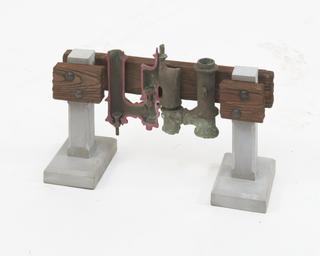 Reproduction in section of ancient Roman Plunger Pump with poppet valves