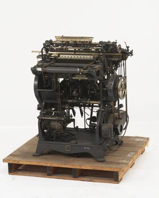 Knitting machine for shaped hose made by Wildman Manufacturing Co