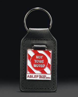 Keyring created by the Associated Society of Locomotive Engineers and Firemen (ASLEF) with the slogan 'not to be moved'